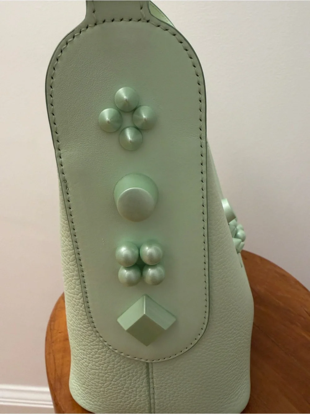 CHRISTIAN LOUBOUTIN Green Pebbled Leather Carasky Bucket Bag